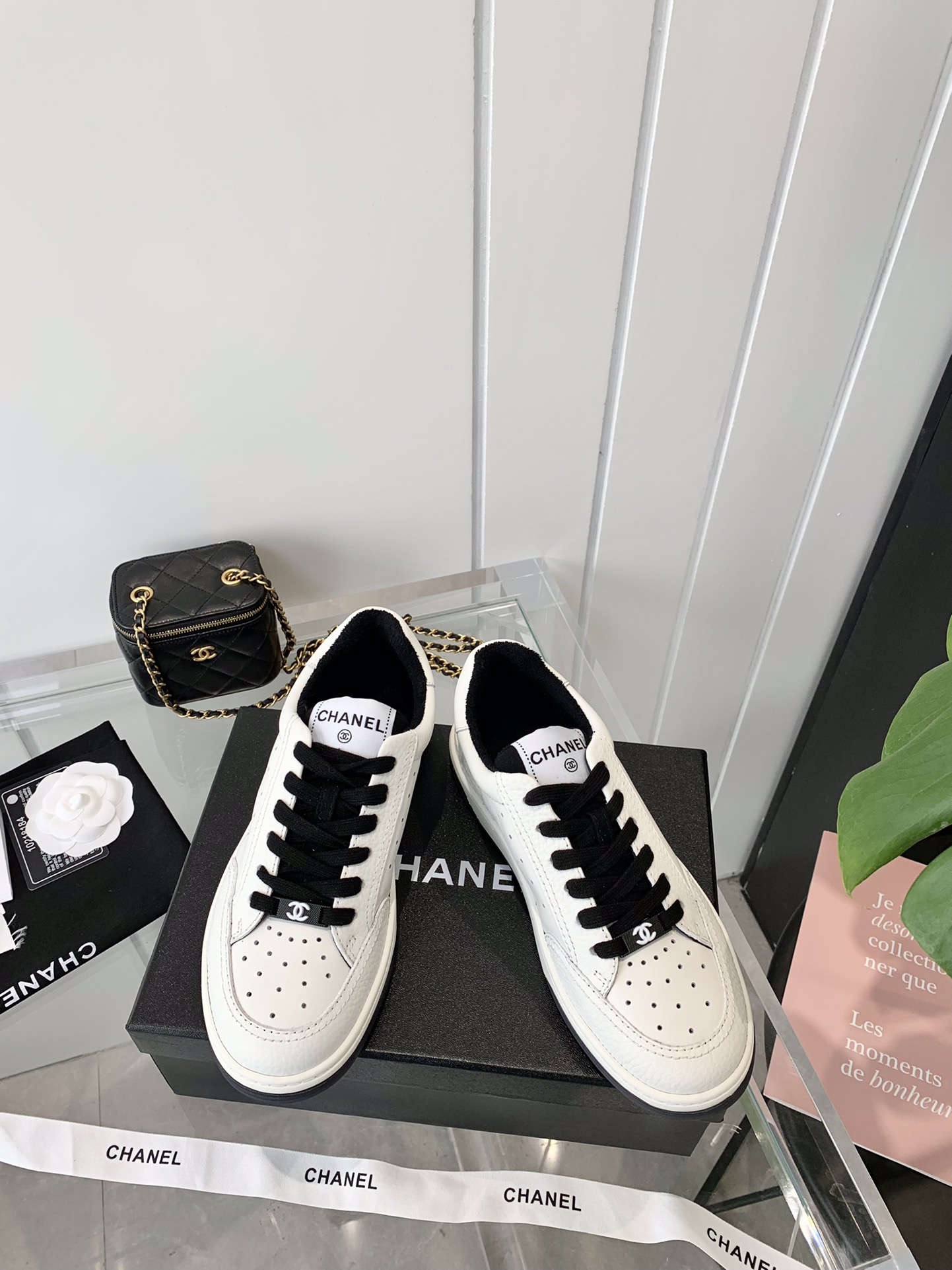 Chanel Embossed Logo Sneakers White/Black