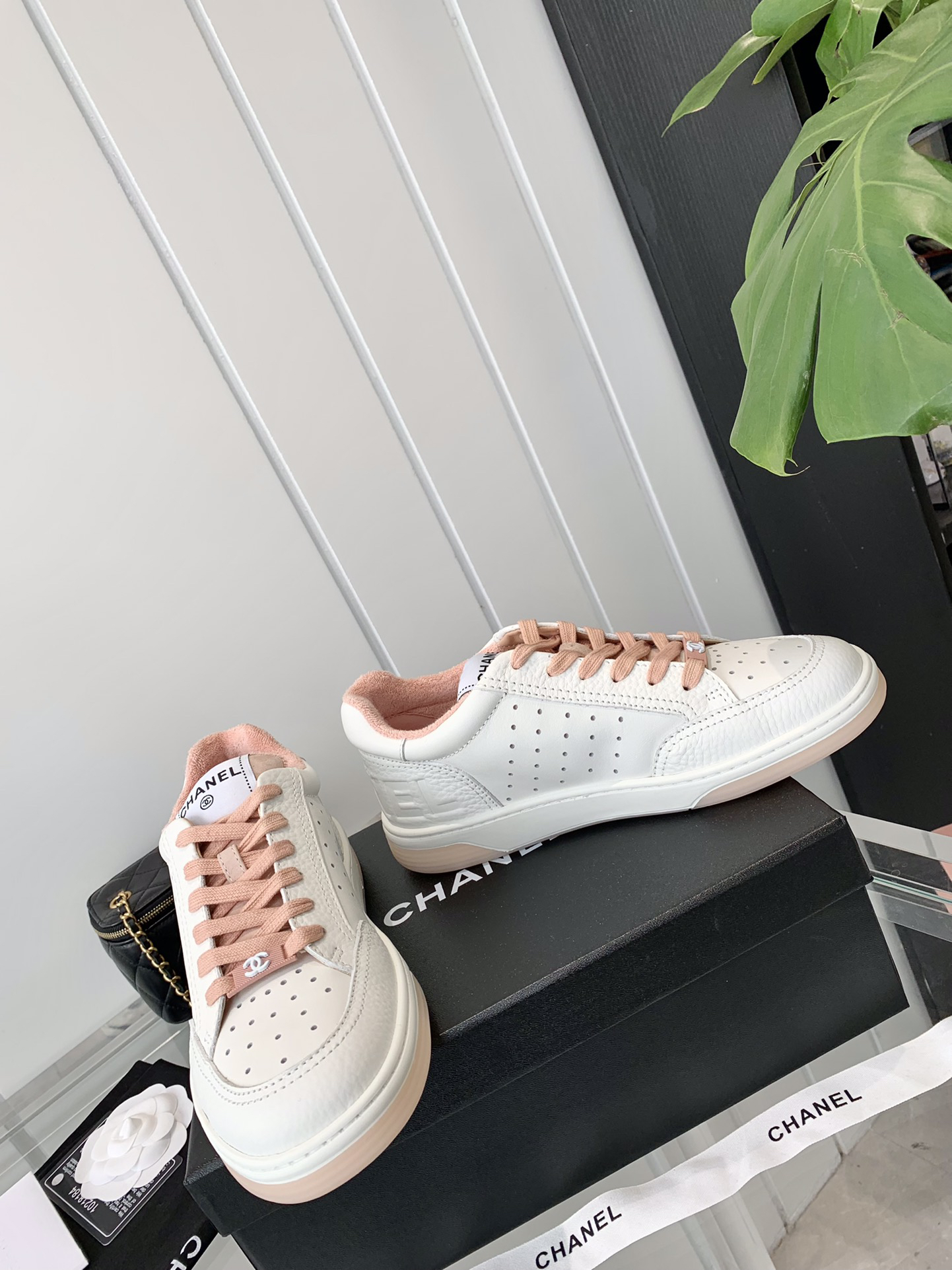 Chanel Air-Embossed Logo Sneakers White Pink