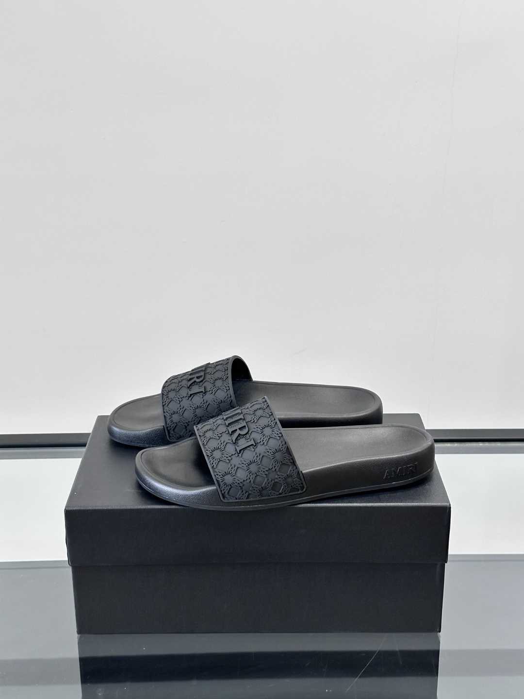 Amiri Embossed Logo Slide Sandals Black