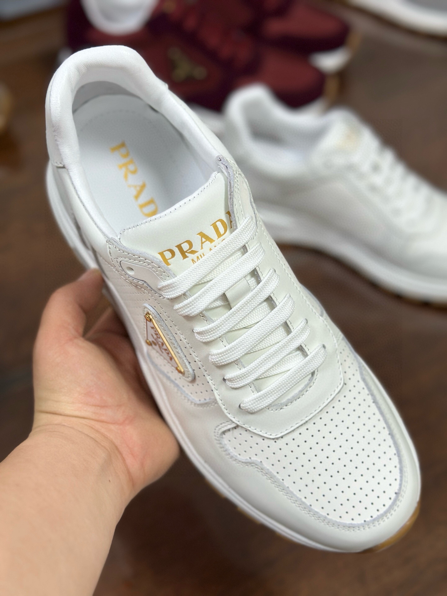 Prada Prax 2.0 Perforated Leather Sneakers White