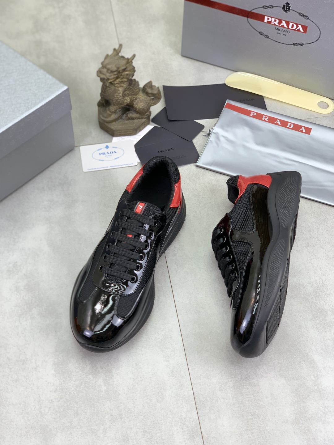 Prada Leather Mesh Sneakers Black/Red