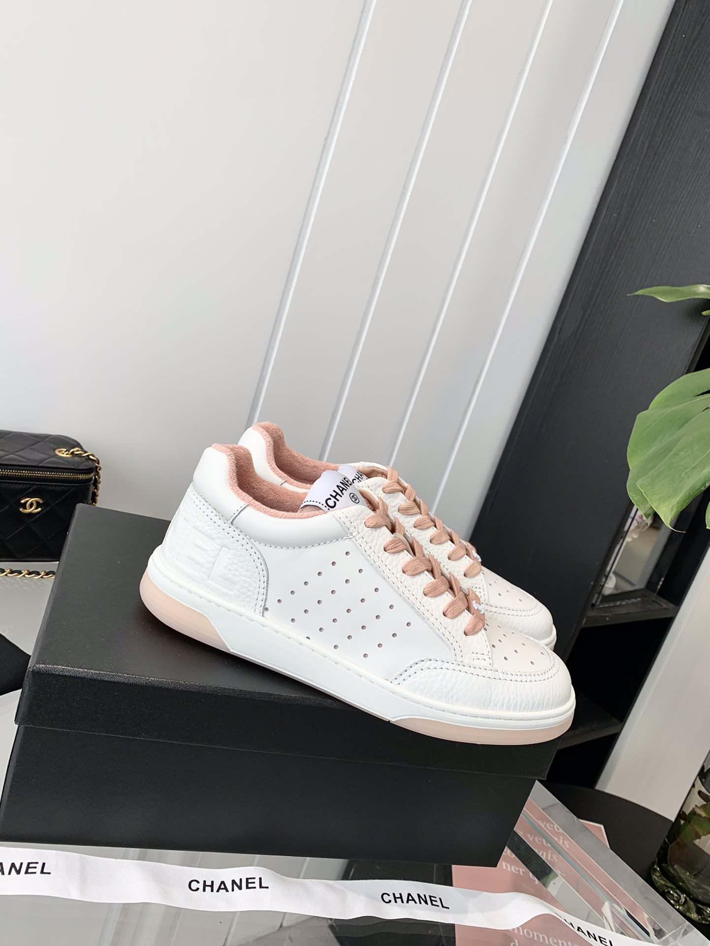 Chanel Air-Embossed Logo Sneakers White Pink