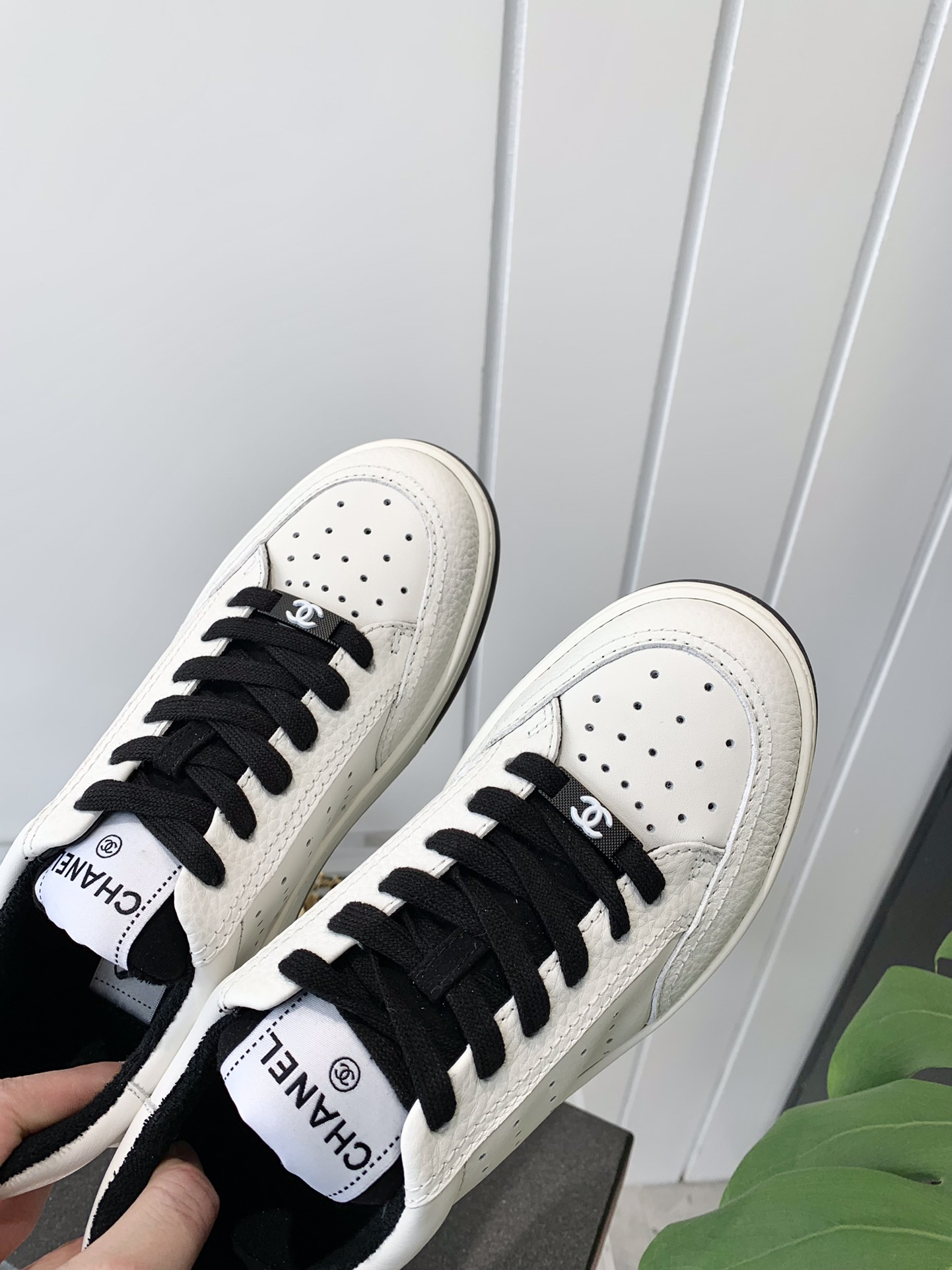 Chanel Embossed Logo Sneakers White/Black