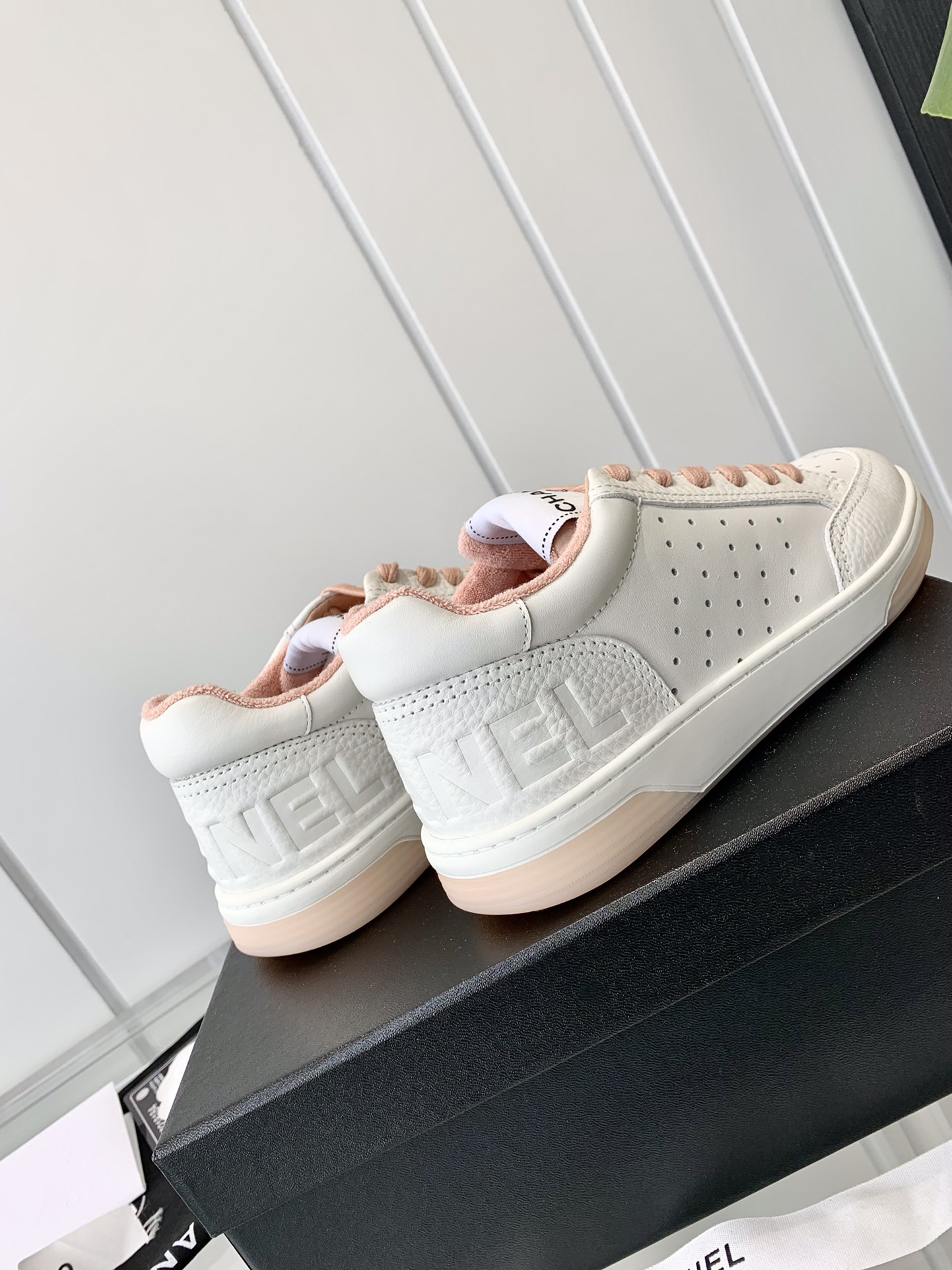 Chanel Air-Embossed Logo Sneakers White Pink