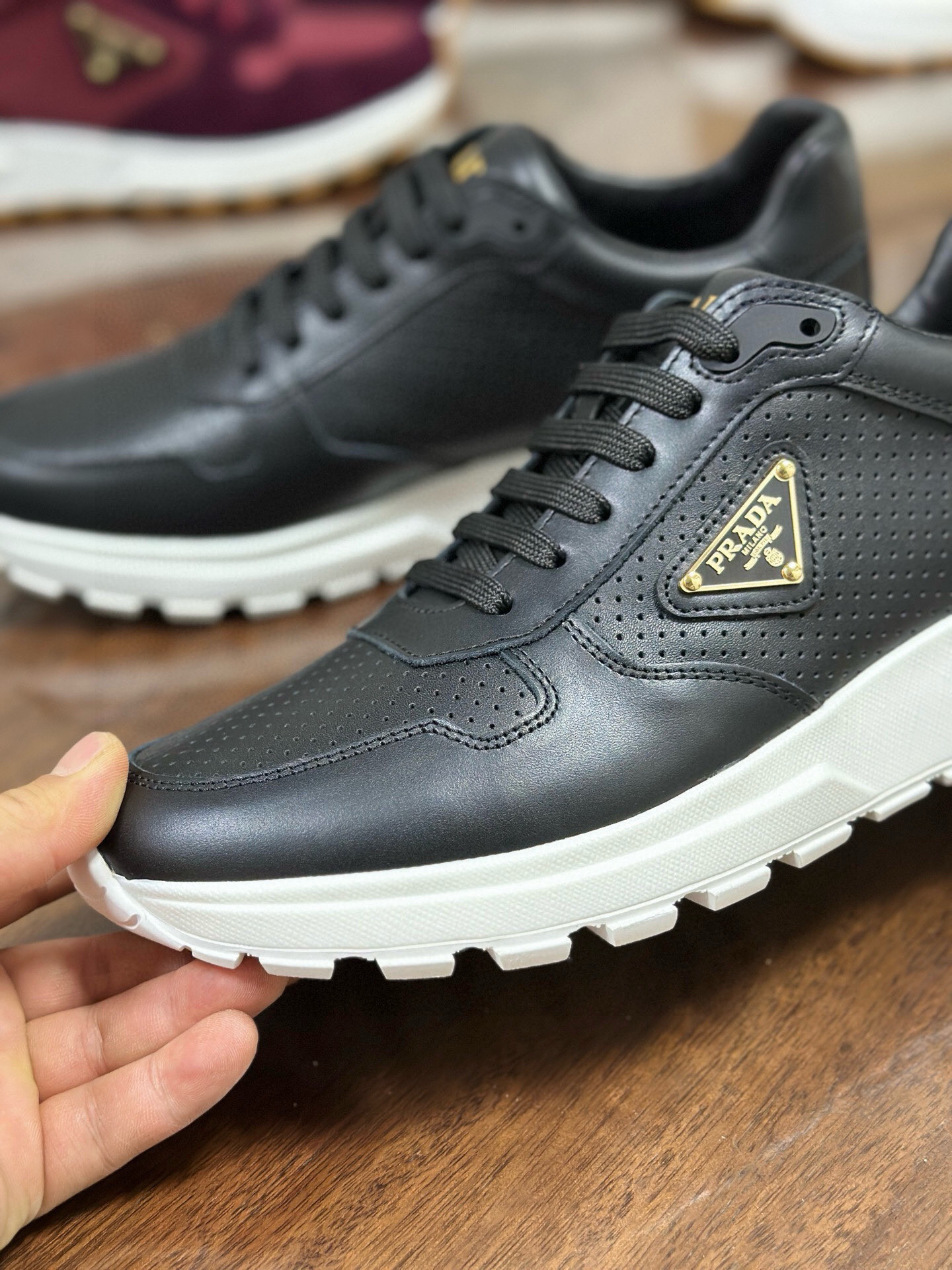 Prada Prax 2.0 Perforated Leather Sneakers Black