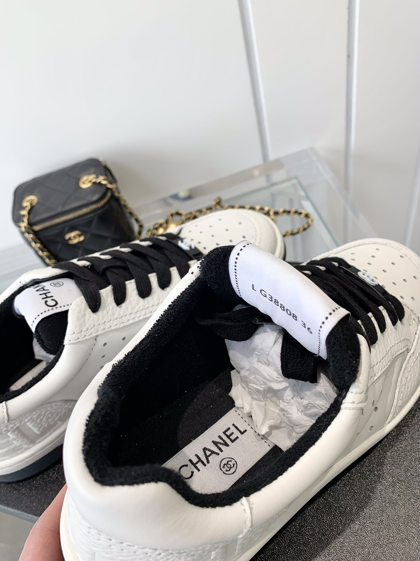 Chanel Embossed Logo Sneakers White/Black