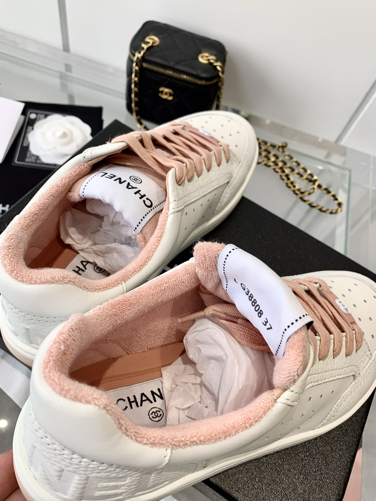 Chanel Air-Embossed Logo Sneakers White Pink