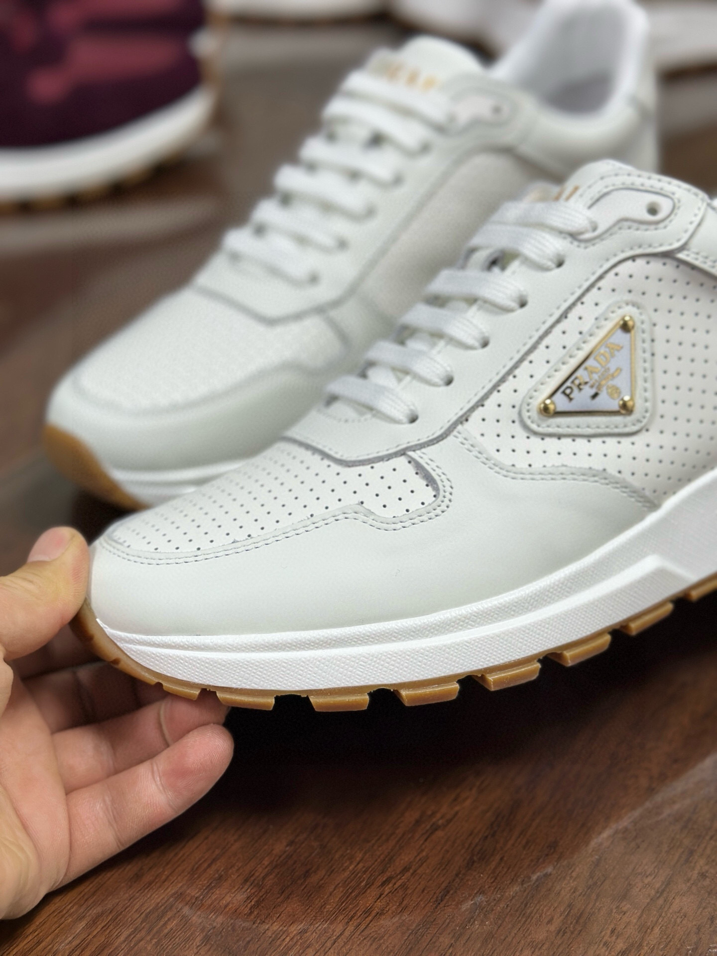 Prada Prax 2.0 Perforated Leather Sneakers White