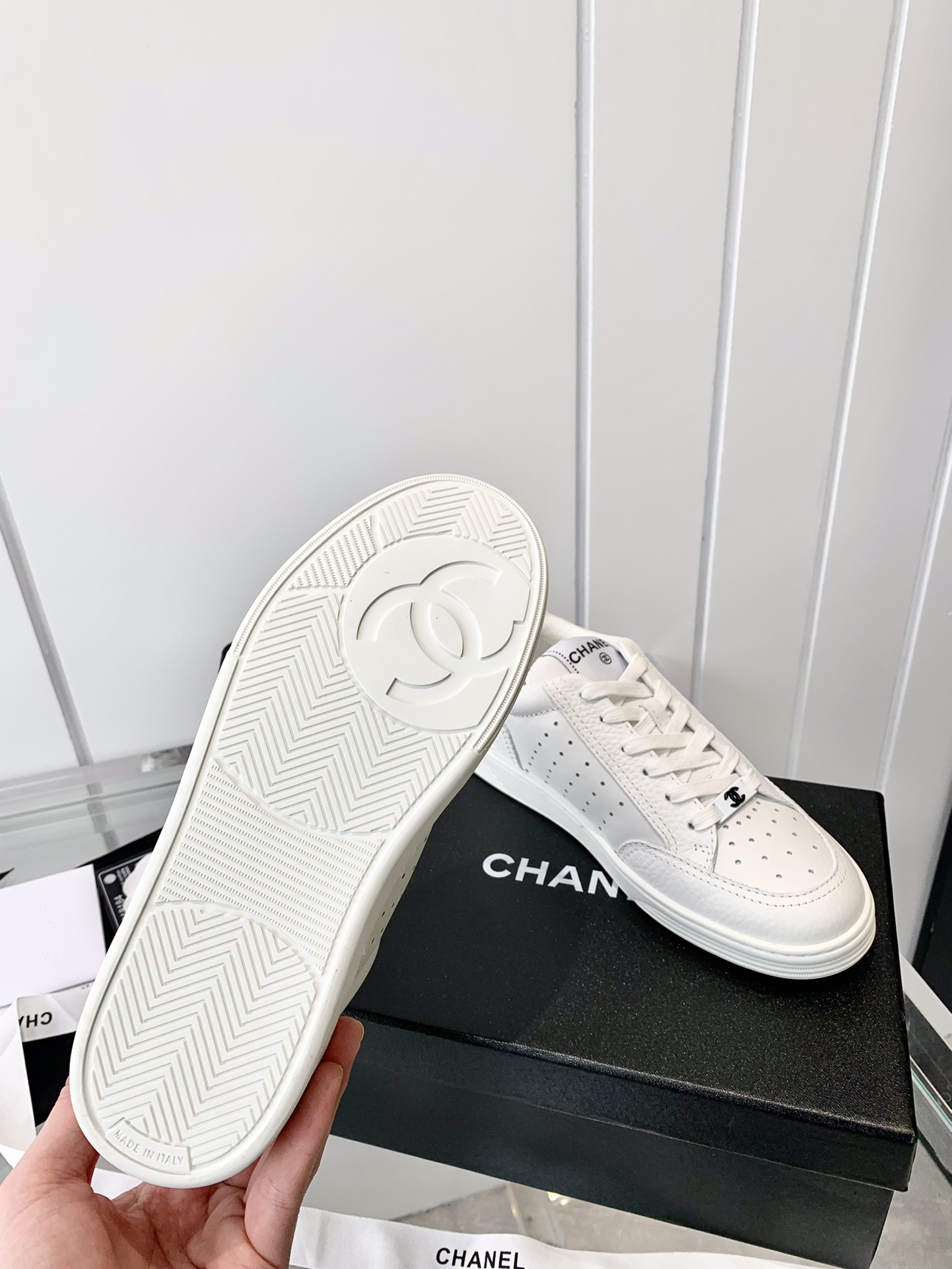 Chanel Embossed Logo Low-Top Sneakers White