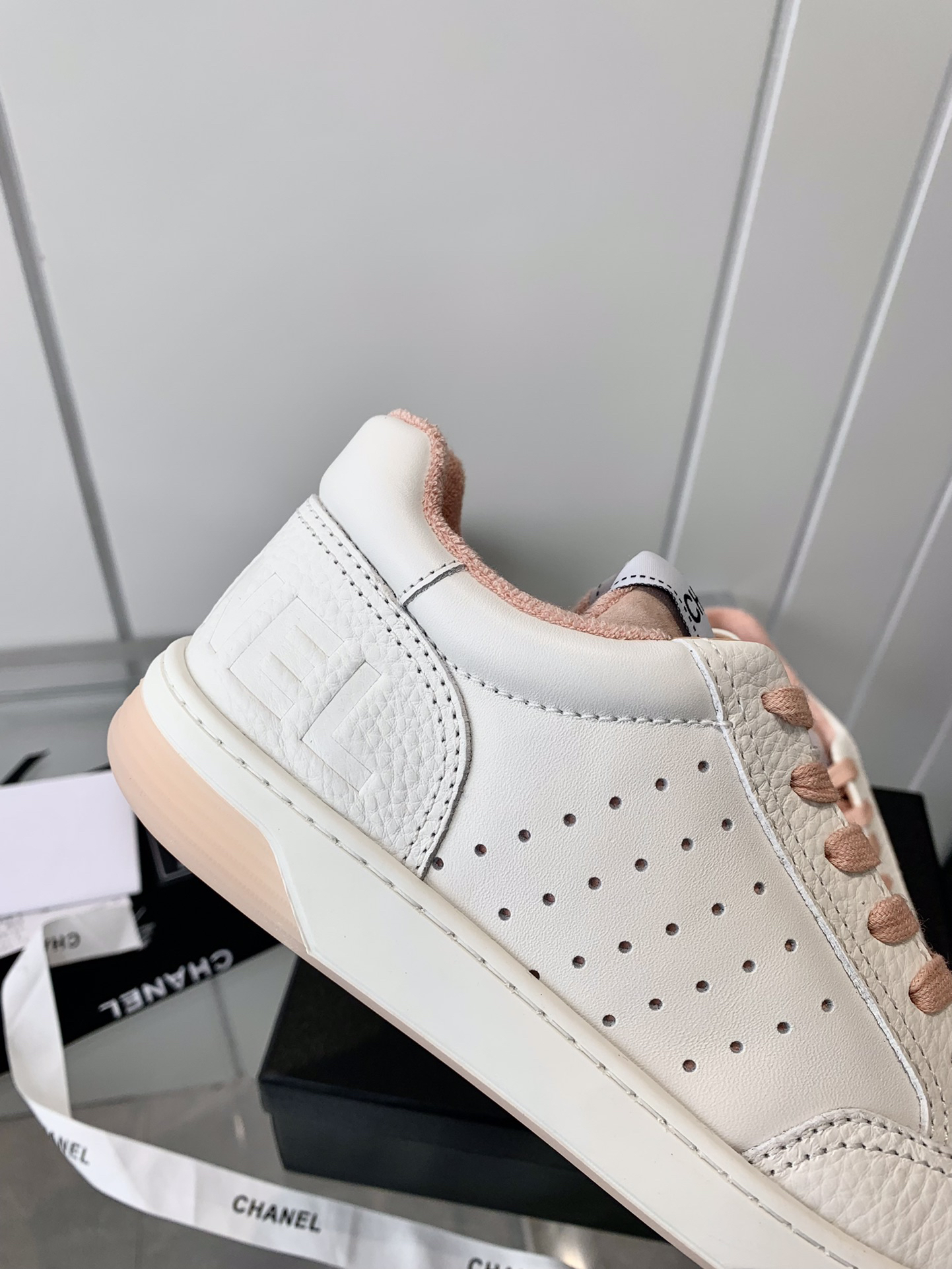 Chanel Air-Embossed Logo Sneakers White Pink