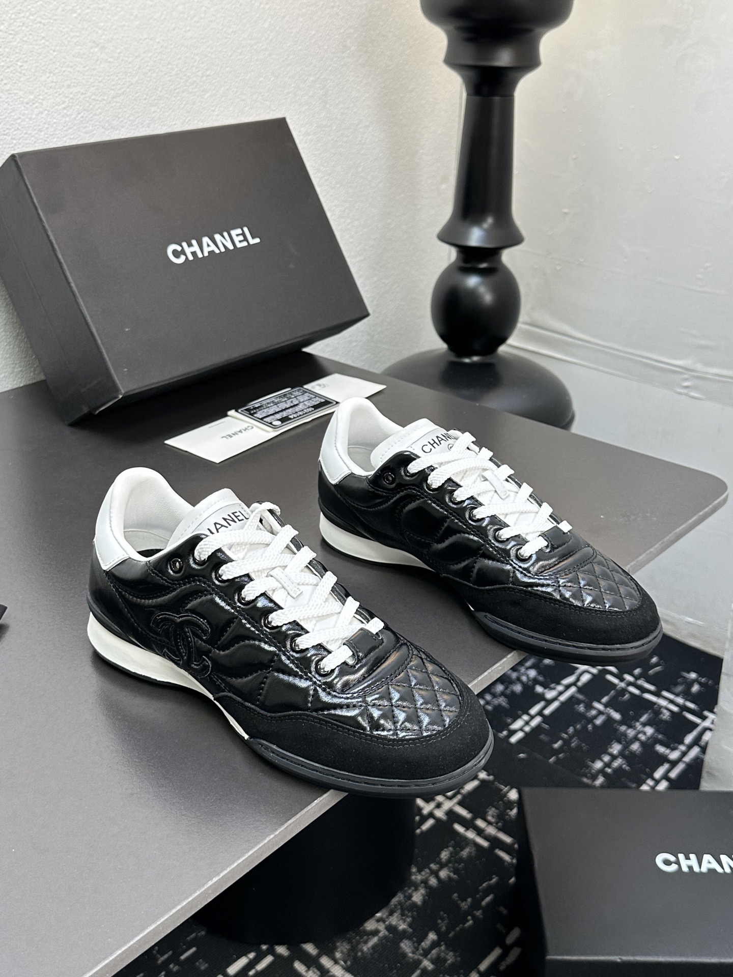 Chanel Quilted Leather Low Sneakers Black/White