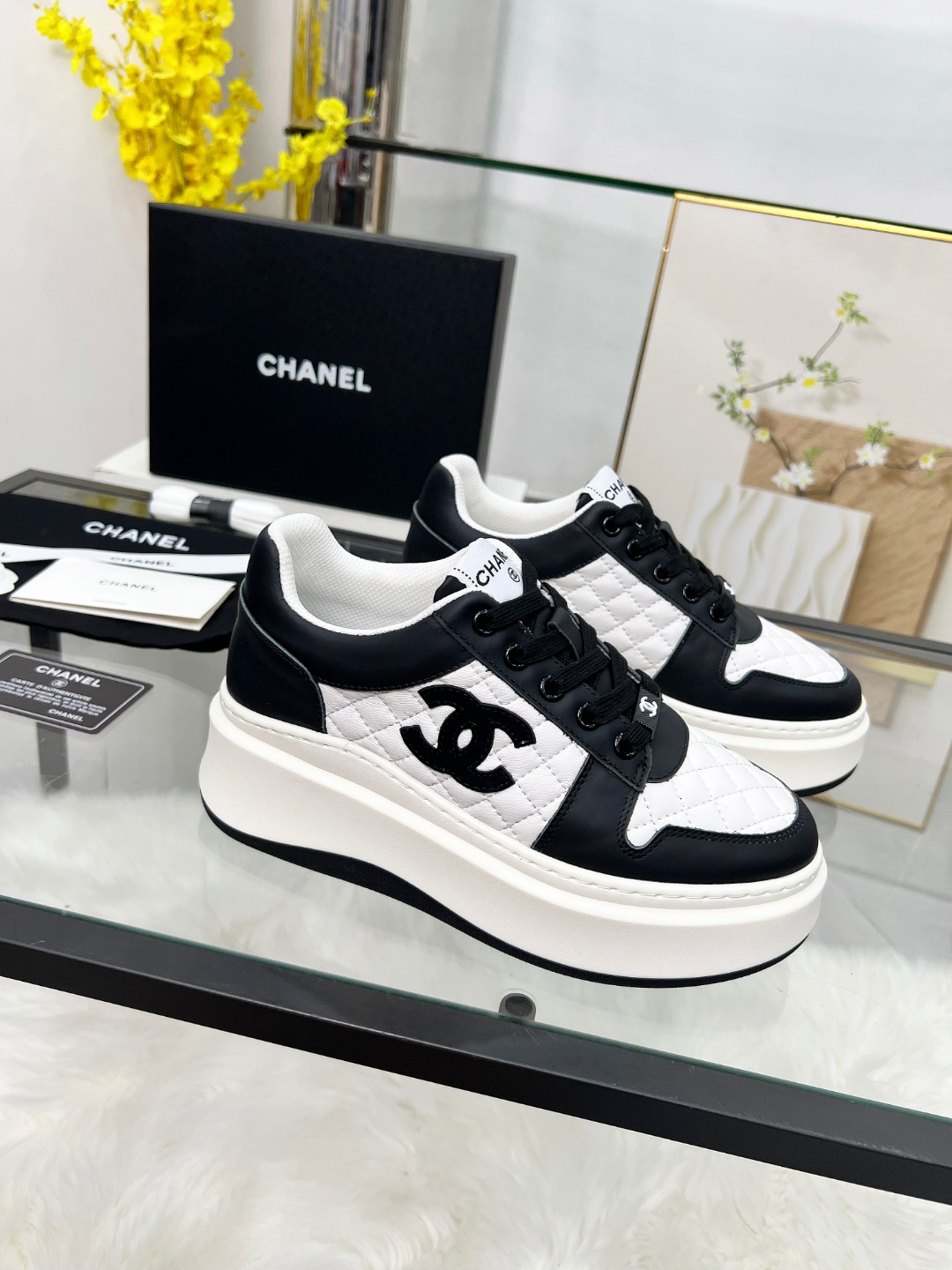Chanel 25C Quilted Platform Sneakers Black/White