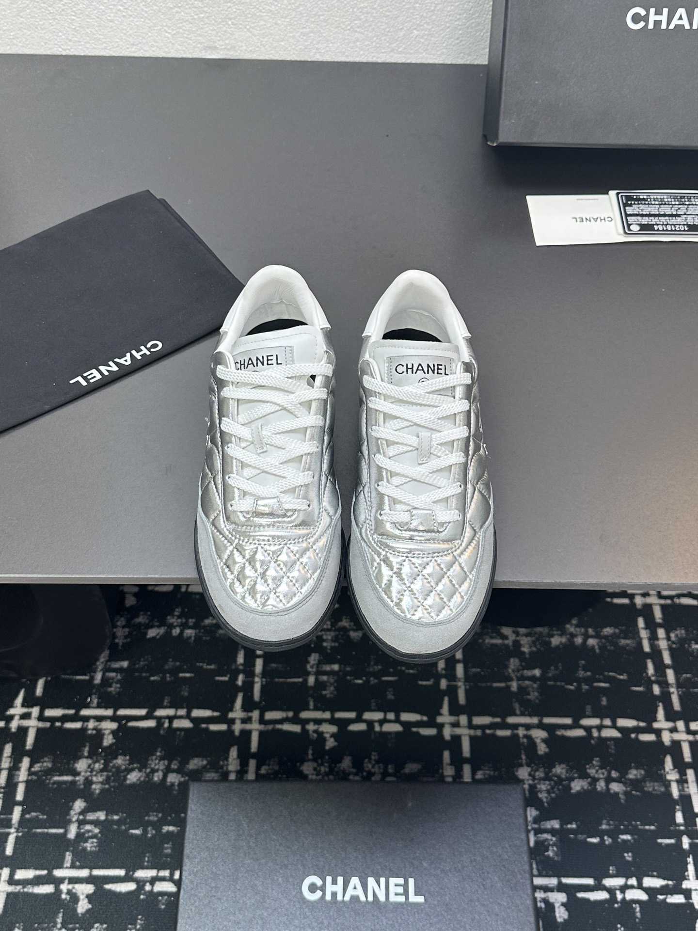 Chanel Quilted Leather Sneakers Silver
