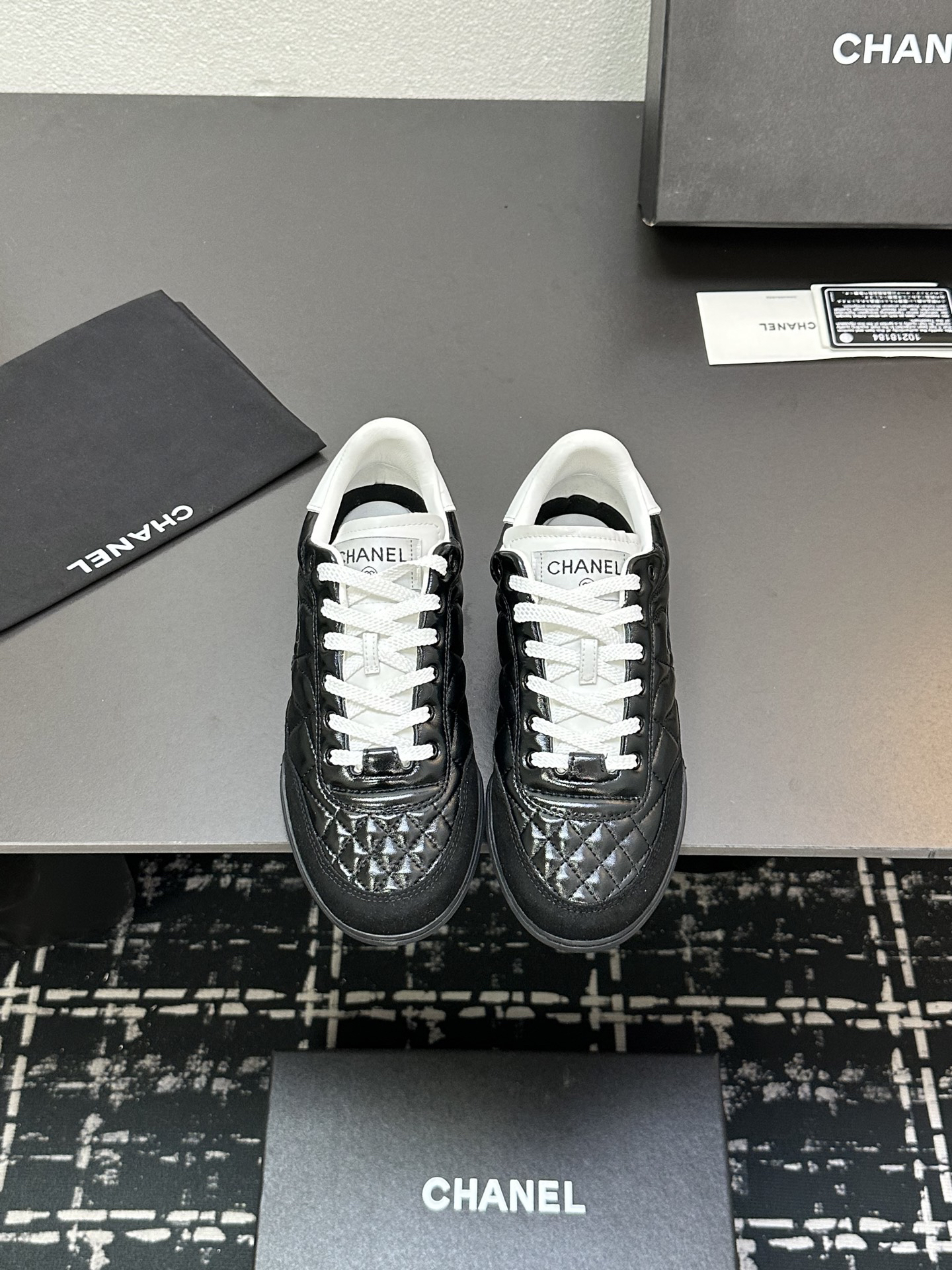 Chanel Quilted Leather Low Sneakers Black/White