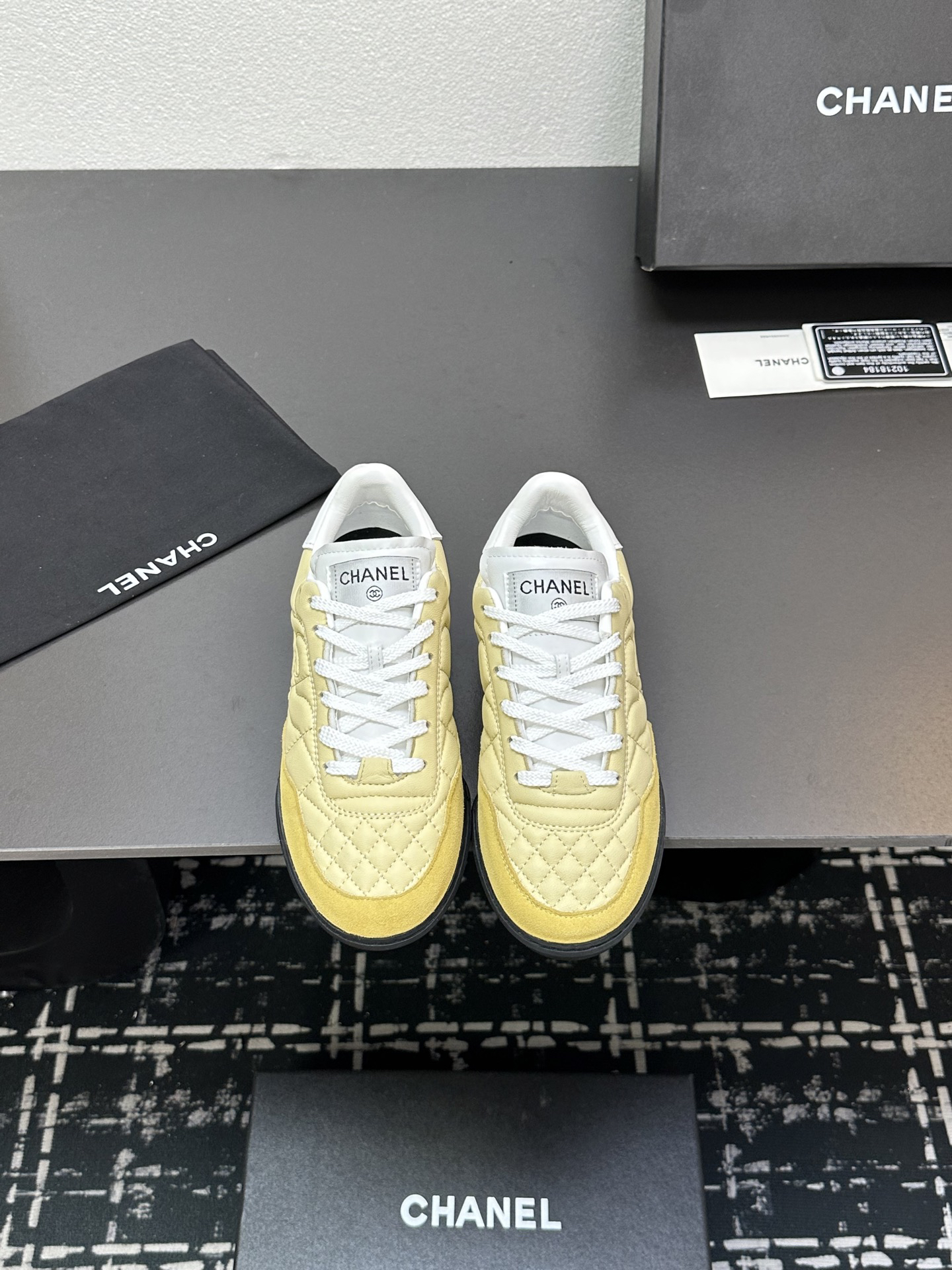 Chanel Quilted Leather Sneakers Beige