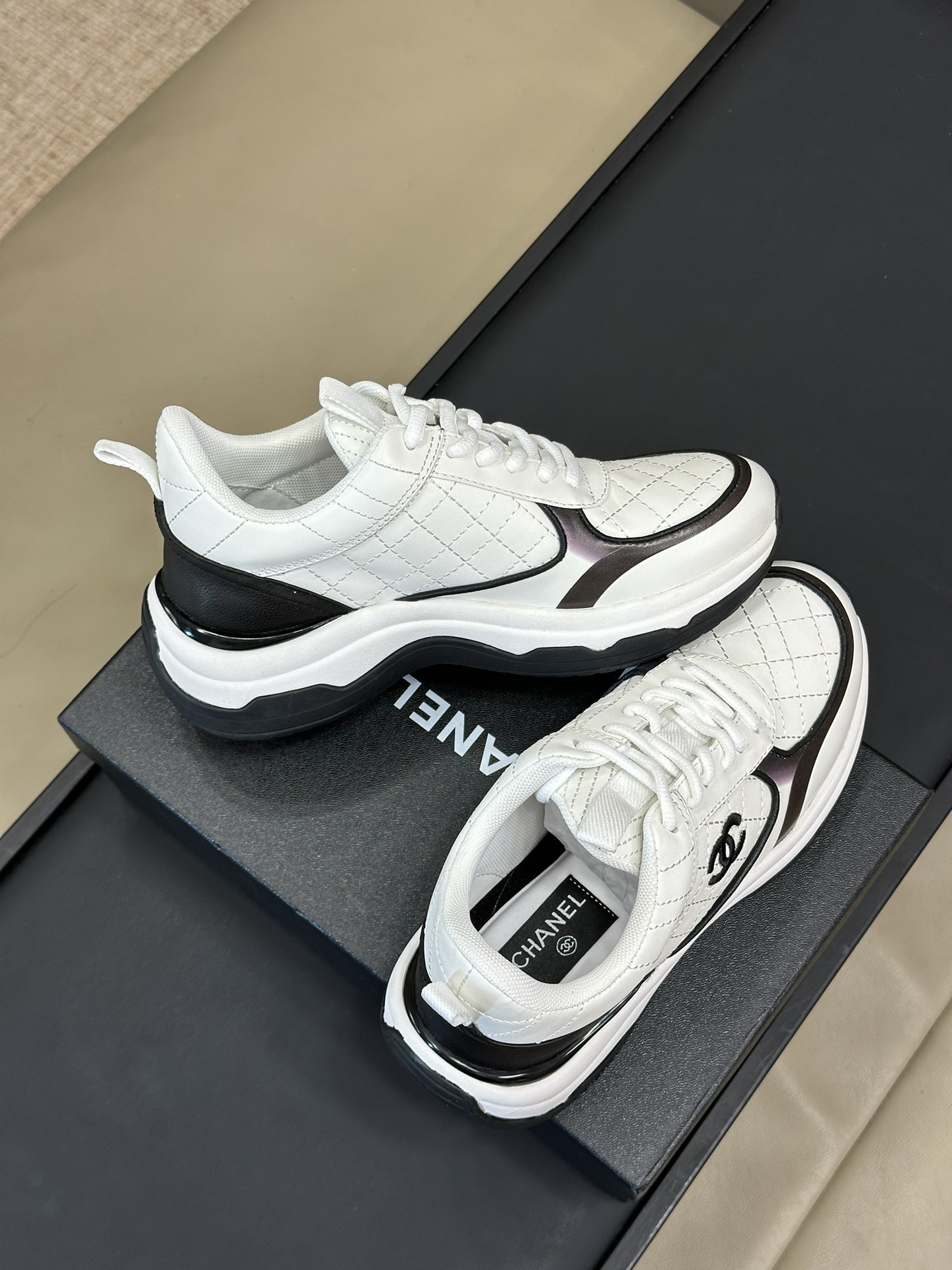 Chanel SS25 Quilted Sneakers White/Black