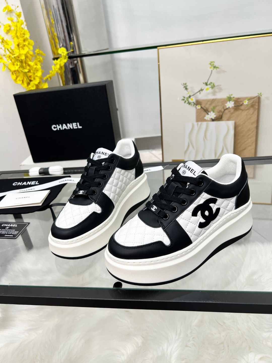 Chanel 25C Quilted Platform Sneakers Black/White