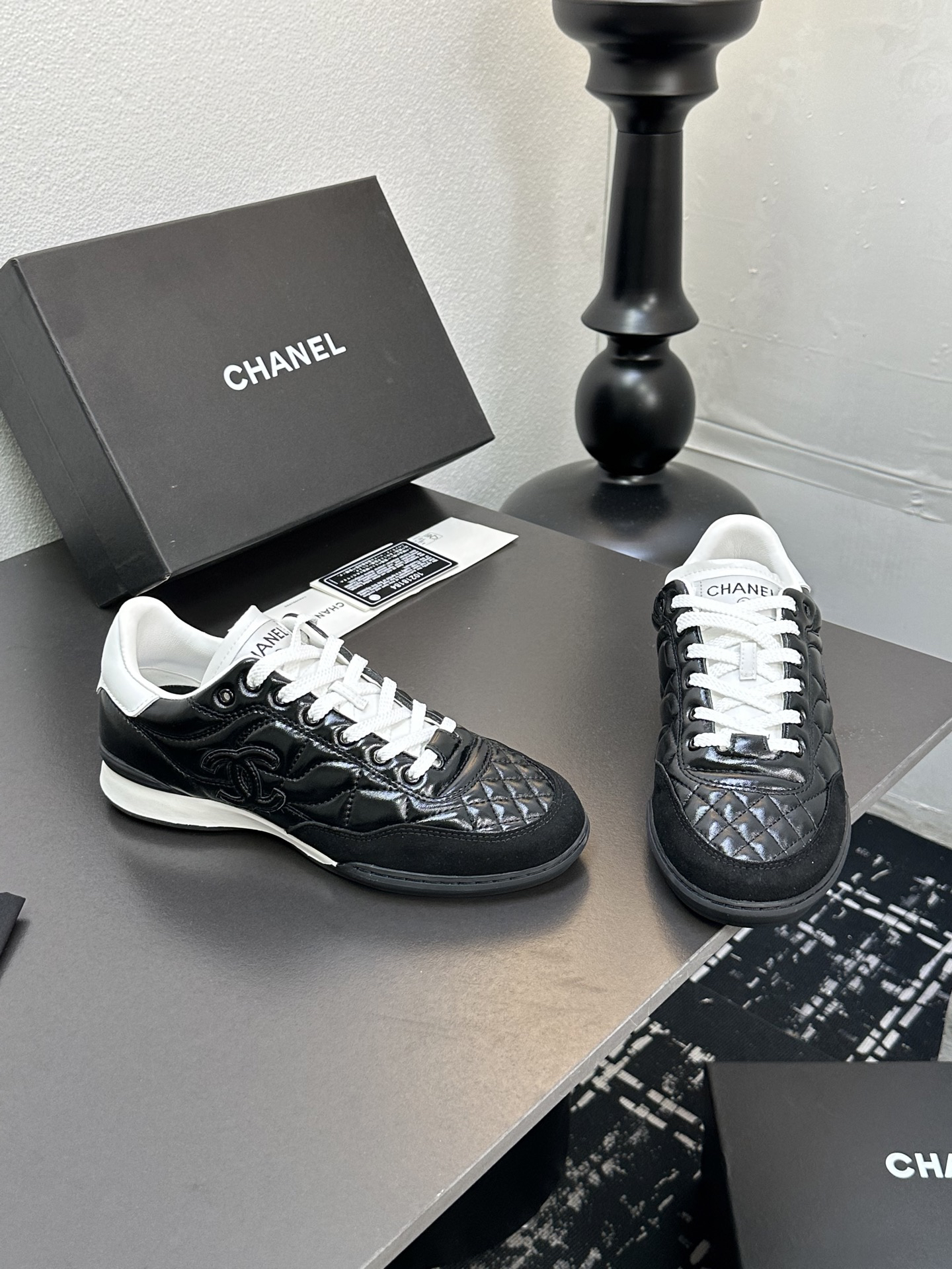 Chanel Quilted Leather Low Sneakers Black/White