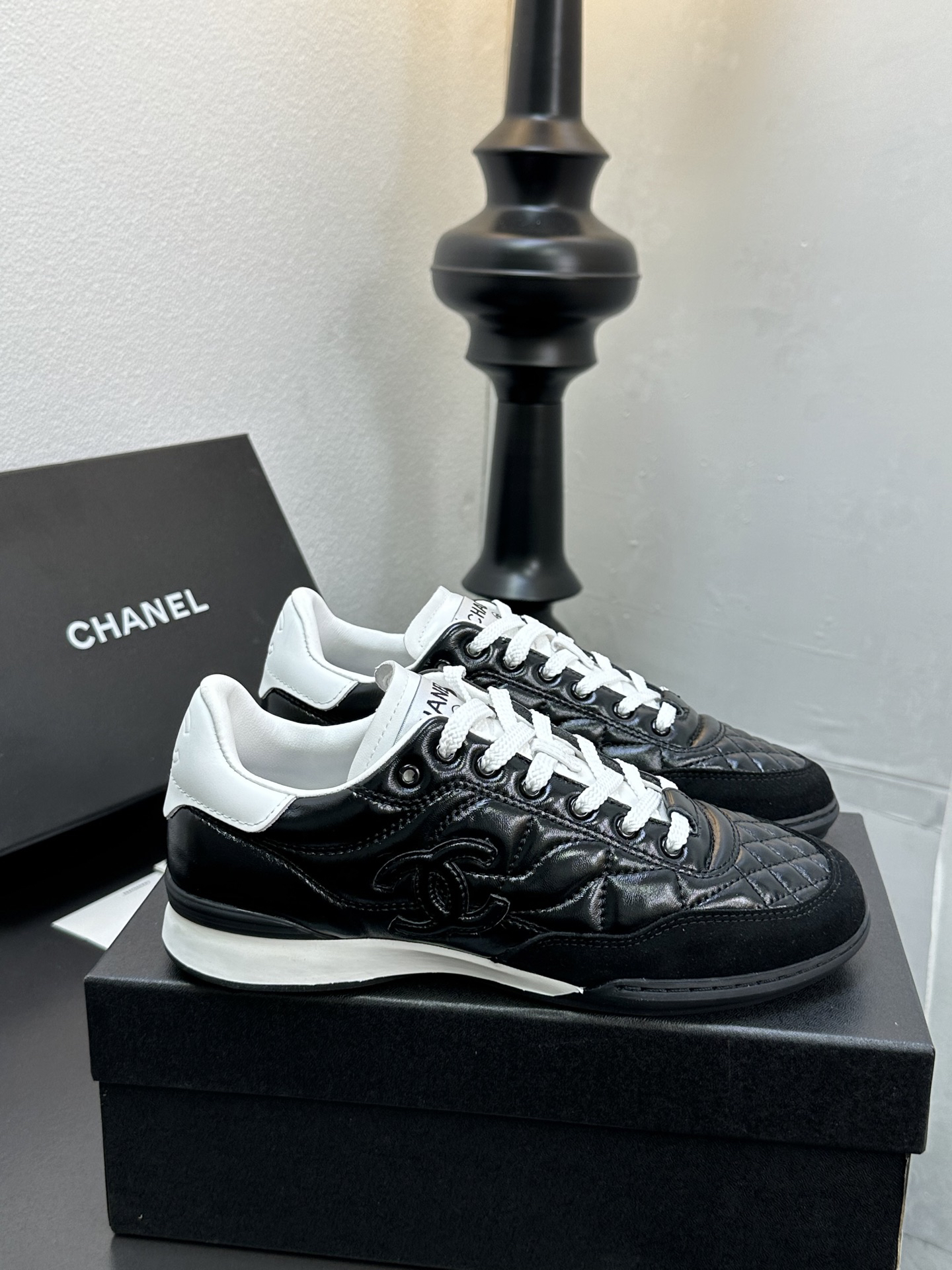 Chanel Quilted Leather Low Sneakers Black/White