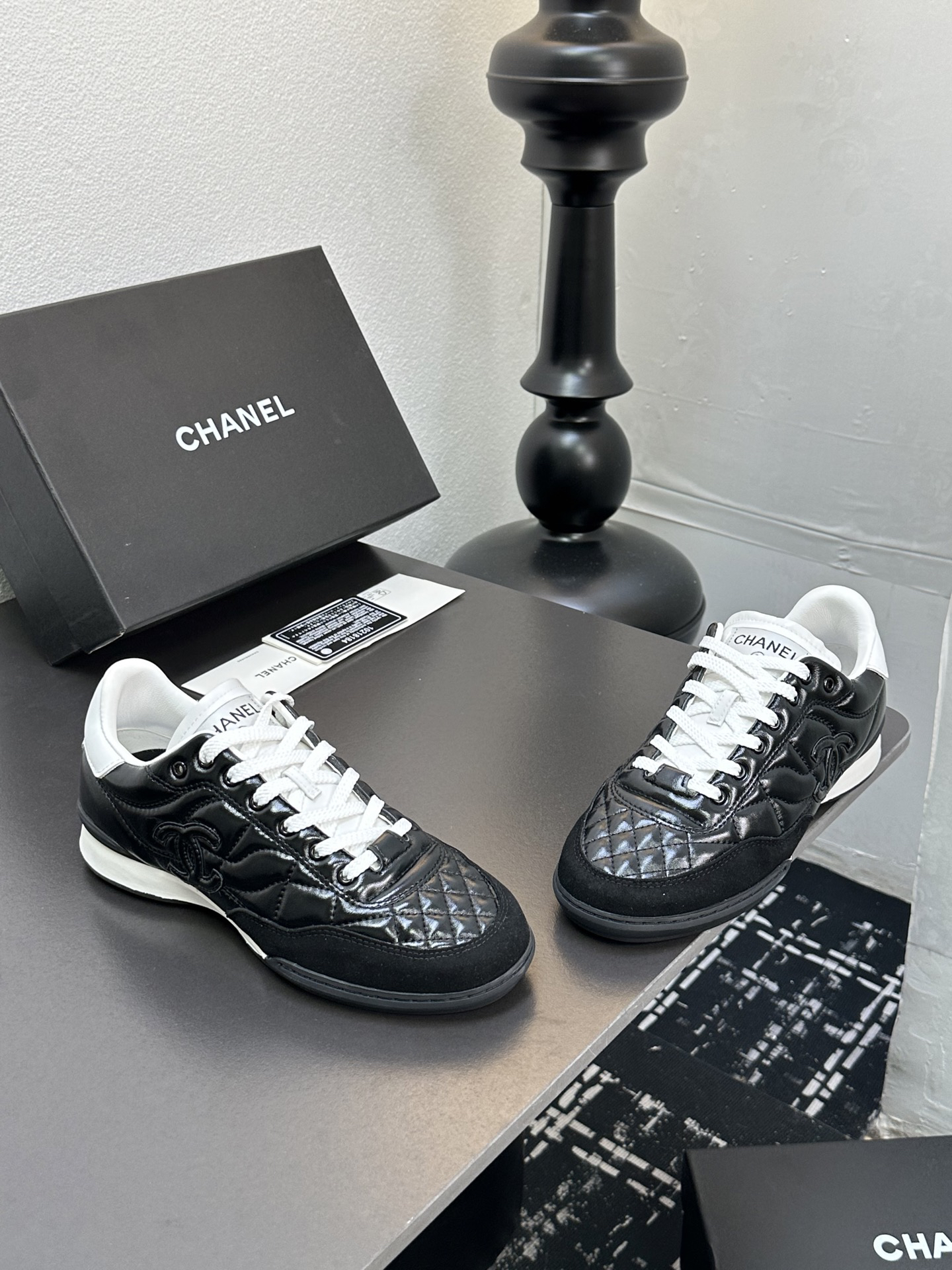 Chanel Quilted Leather Low Sneakers Black/White