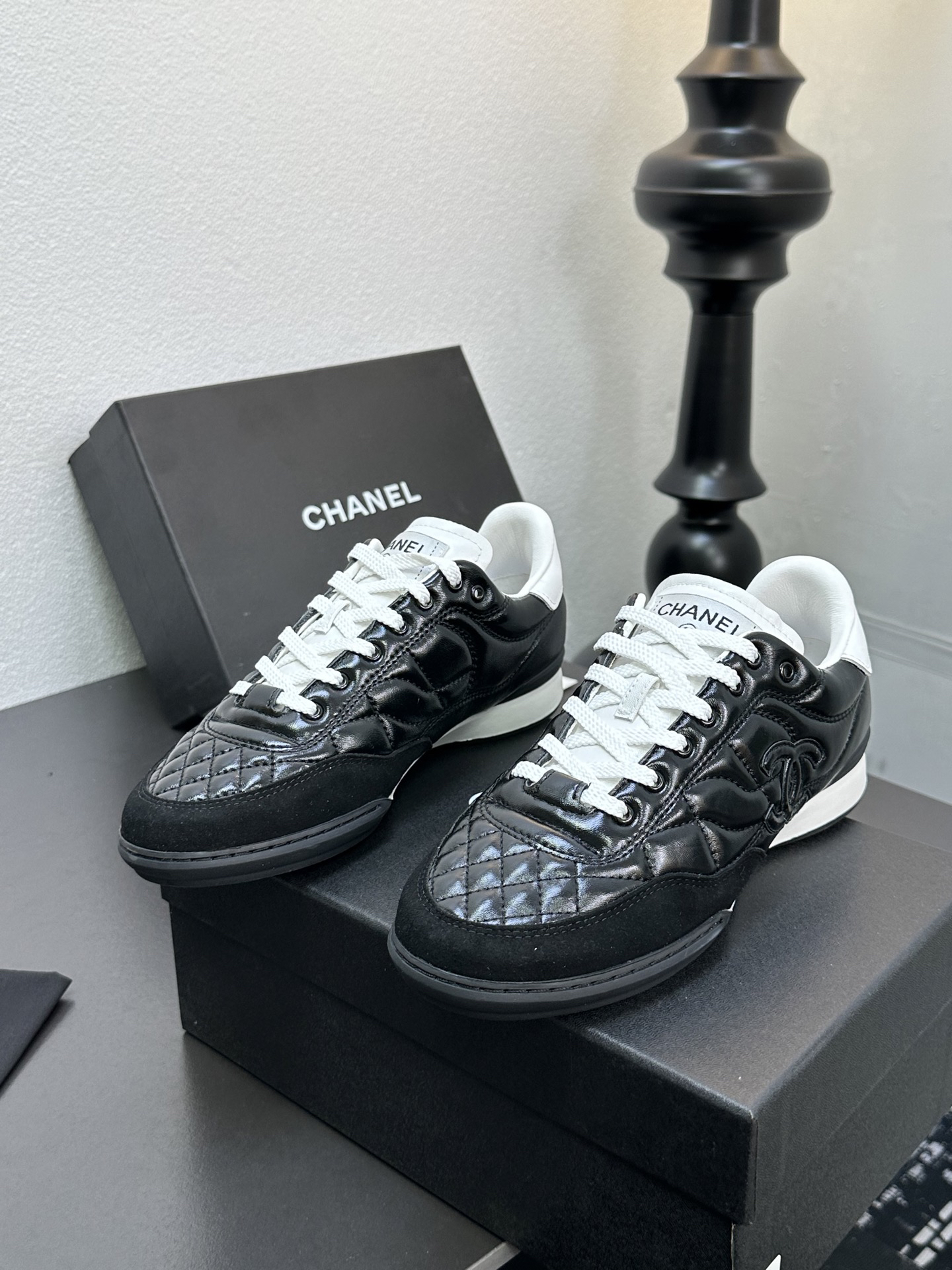Chanel Quilted Leather Low Sneakers Black/White