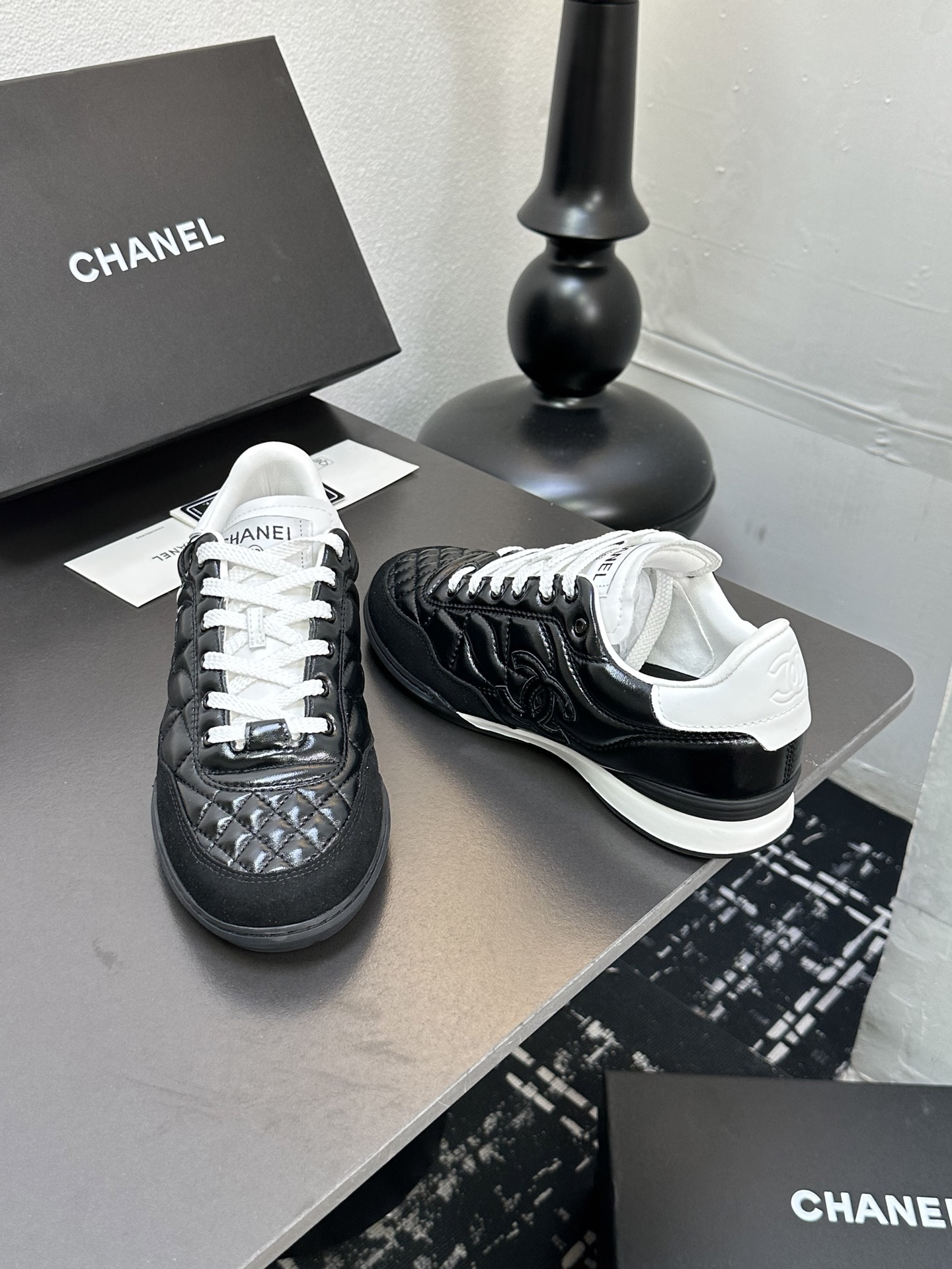Chanel Quilted Leather Low Sneakers Black/White